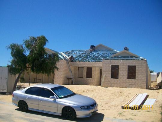 Dutch gable on hip end truss dutch gable